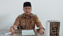 Kepala Desa Ciseeng, Rakhmat Bukhori Muslim